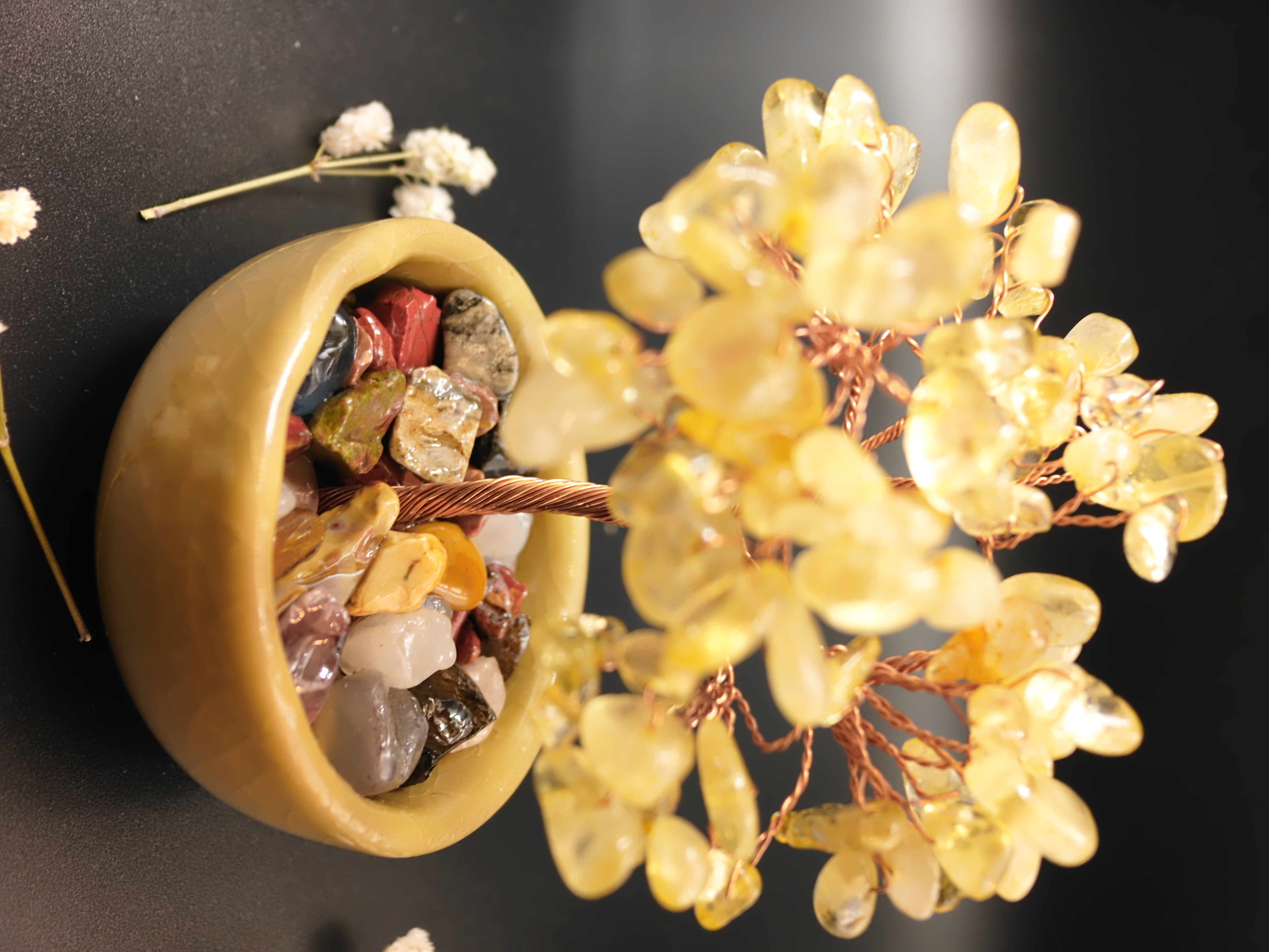Handcrafted citrine bonsai tree showing translucent yellow gemstone chips on twisted copper wire branches